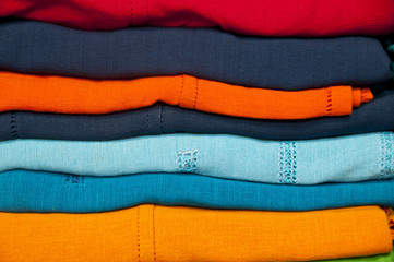 Rainbow clothes pile