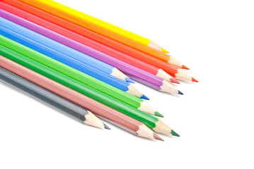 colorful pencils close-up on white