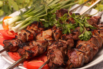 grilled meat on skewers