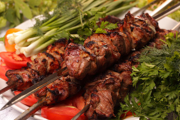 grilled meat on skewers