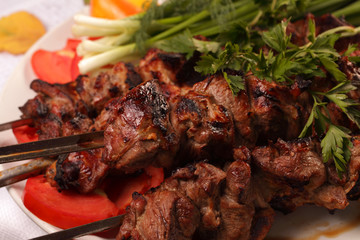 grilled meat on skewers