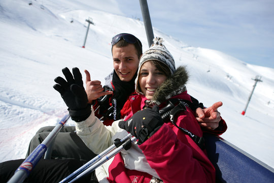 duo at ski in ski lift