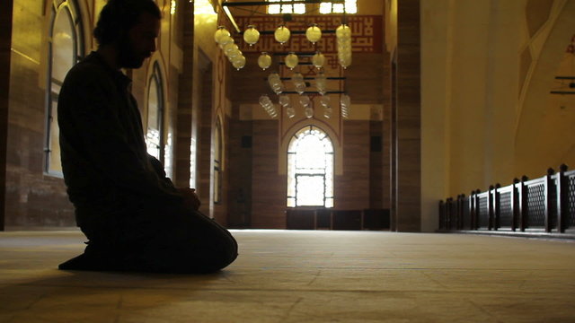 namaz: muslim man worship in mosque