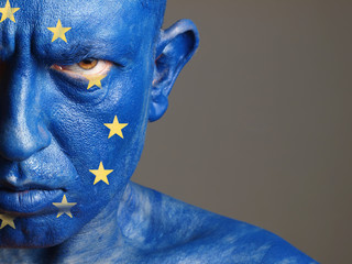 Man face painted with the flag of European Union