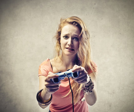 Blonde Girl Playing Video Game