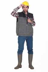 Tradesman giving a salute