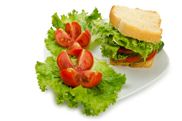 Tomatoes and cucumbers on white