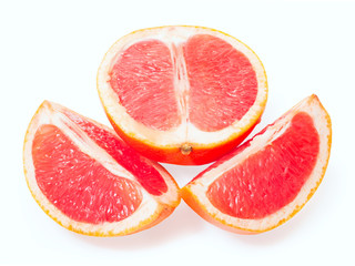 Fototapeta na wymiar Slices of grapefruit isolated on white background
