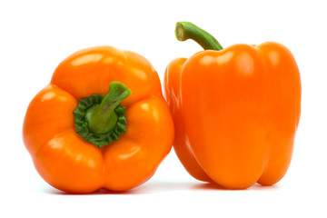 Two sweet peppers isolated on white closeup