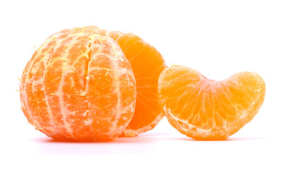 Peeled slices of tangerine on white