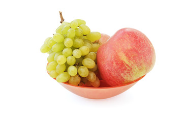 Grapes and apples on a plate