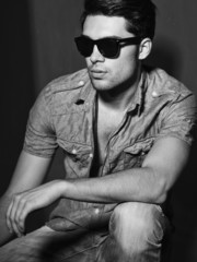 Vintage stylized black and white photo of young male model