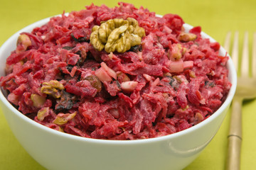 Salad with beets, dried plums, nuts