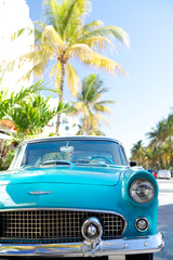 Vintage car in ocean drive