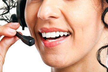 Closeup of a female call center operator