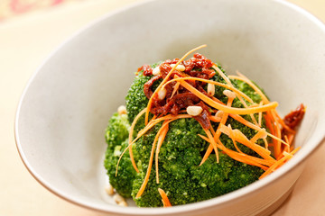 broccoli with carrot and dried tomato