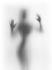 Diffuse woman body silhouette, behind a curtain