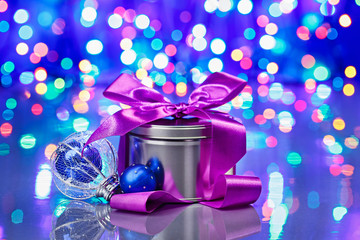 New Year decorations composition with fancy box on bokeh backgro