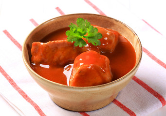 Pork meat in tomato sauce