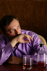 man with whiskey and cigarette