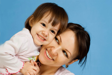 Smile Caucasian lady with a daughter
