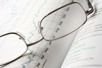 Glasses on an open book