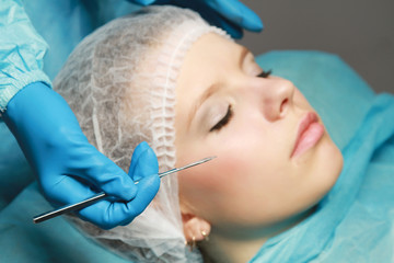 A woman receiving plastic operation