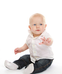 A kid sitting on the floor