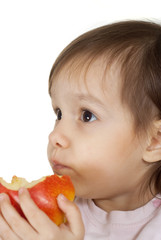 Happy Caucasian girl with an apple