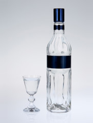 Bottle and glass of vodka