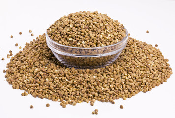 dish of buckwheat isolated on white