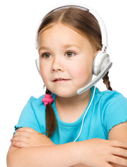 Young girl is working as an operator at helpline