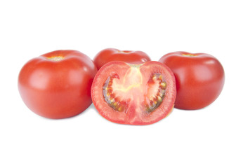 Fresh tomatoes isolated on white