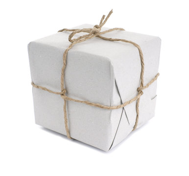 Parcel wrapped with  paper, tied with string