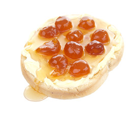 Slice of bread with butter and white cherry jam