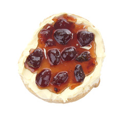 Slice of bread with butter and strawberry jam