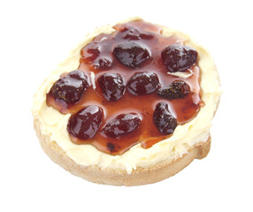 Slice of bread with butter and strawberry jam