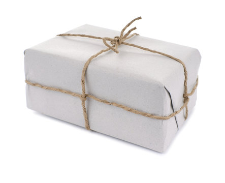 Parcel wrapped with  paper, tied with string