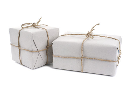 Parcels wrapped with paper, tied with string