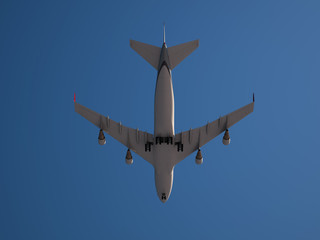 Large Jumbo Jet isolated on clear and blue Sky