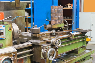 Old lathe in workshop of the plant