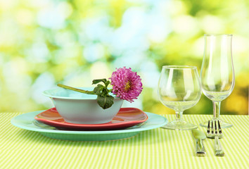 Table setting on bright background close-up