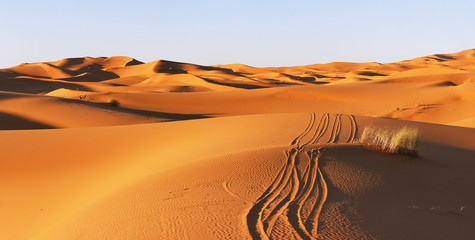 route in the dunes of Sahara desert in Morocco