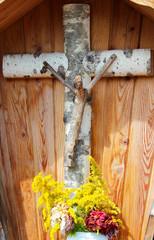 Wooden cross on hiking trial, Austrian Alps
