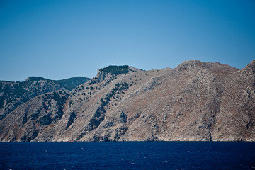 Fototapeta na wymiar Turquoise seascape with an island