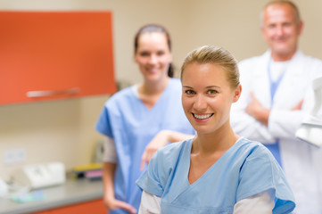 Smiling medical professional team at the surgery