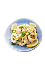 rings squid with parsley and lemon