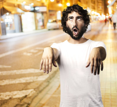 man imitating zombie