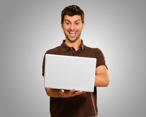 Portrait Of A Young Male With Laptop