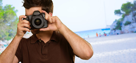 Man Holding Camera